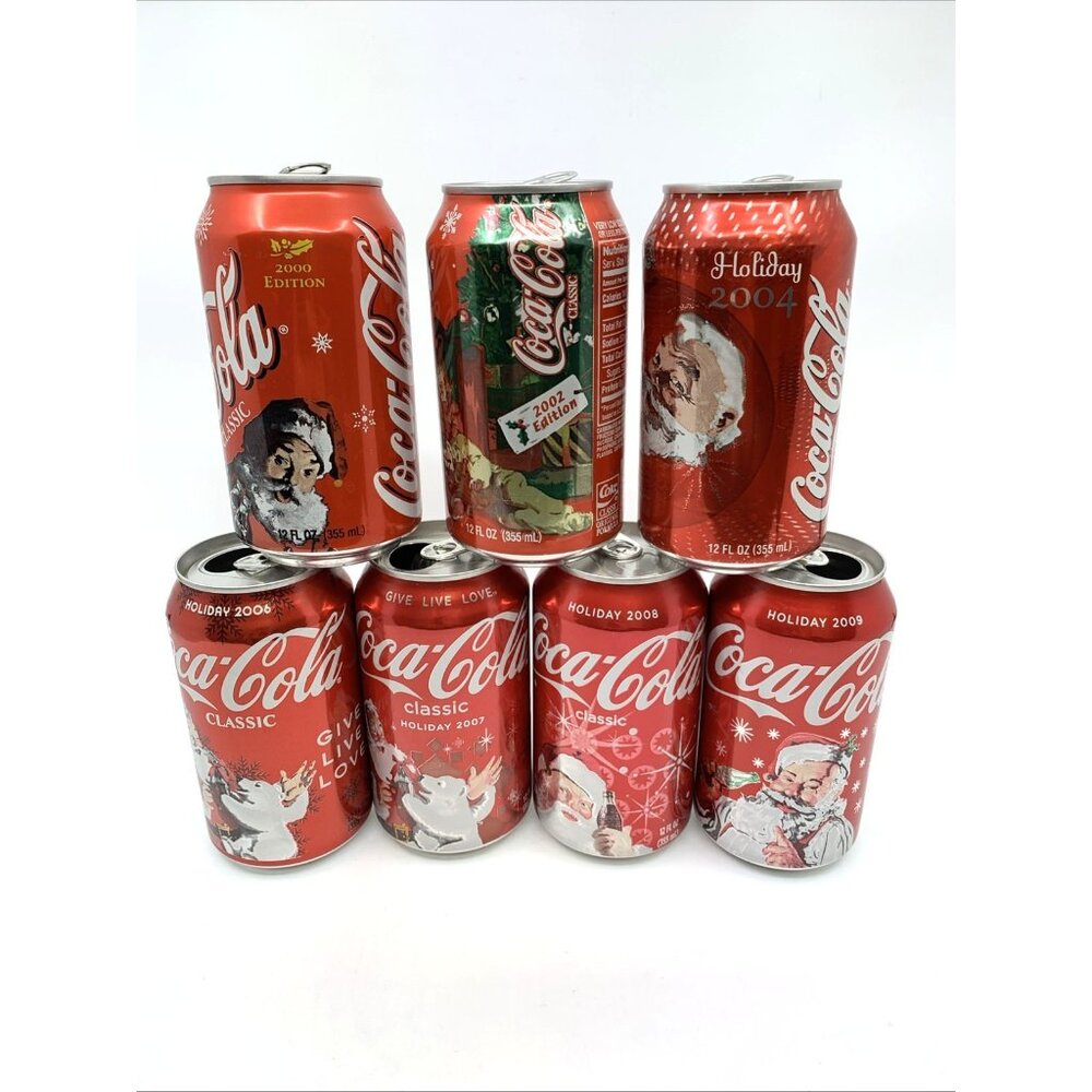 7 Empty Vintage Coca-Cola Classic Holiday Cans 2000 2002 2004 2006 2007 2008 '09